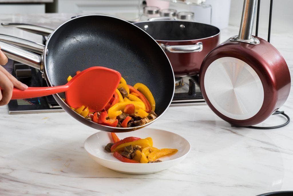 Breakfast is served from a non-stick pan into tableware.