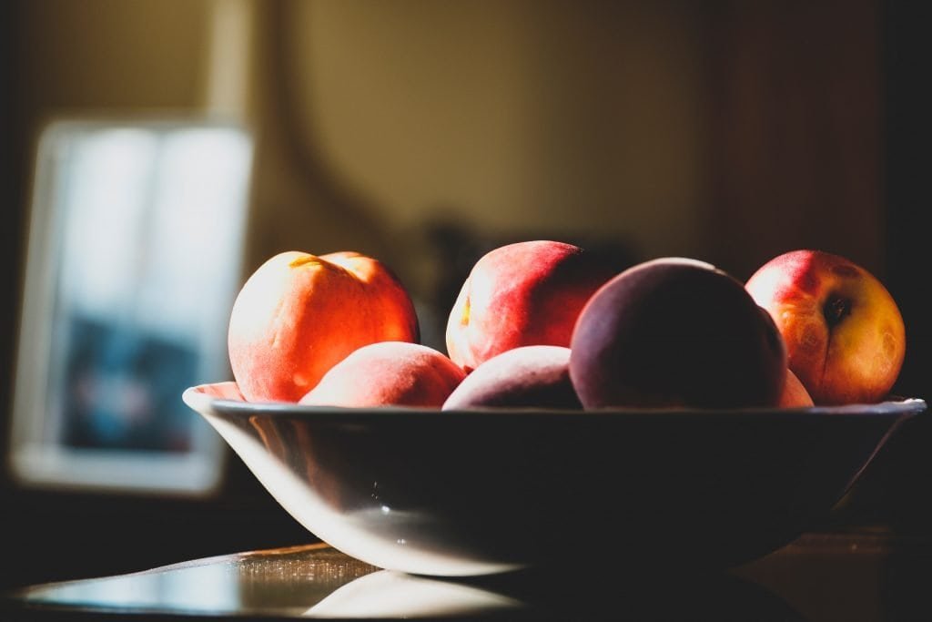 Peaches in a bowl.