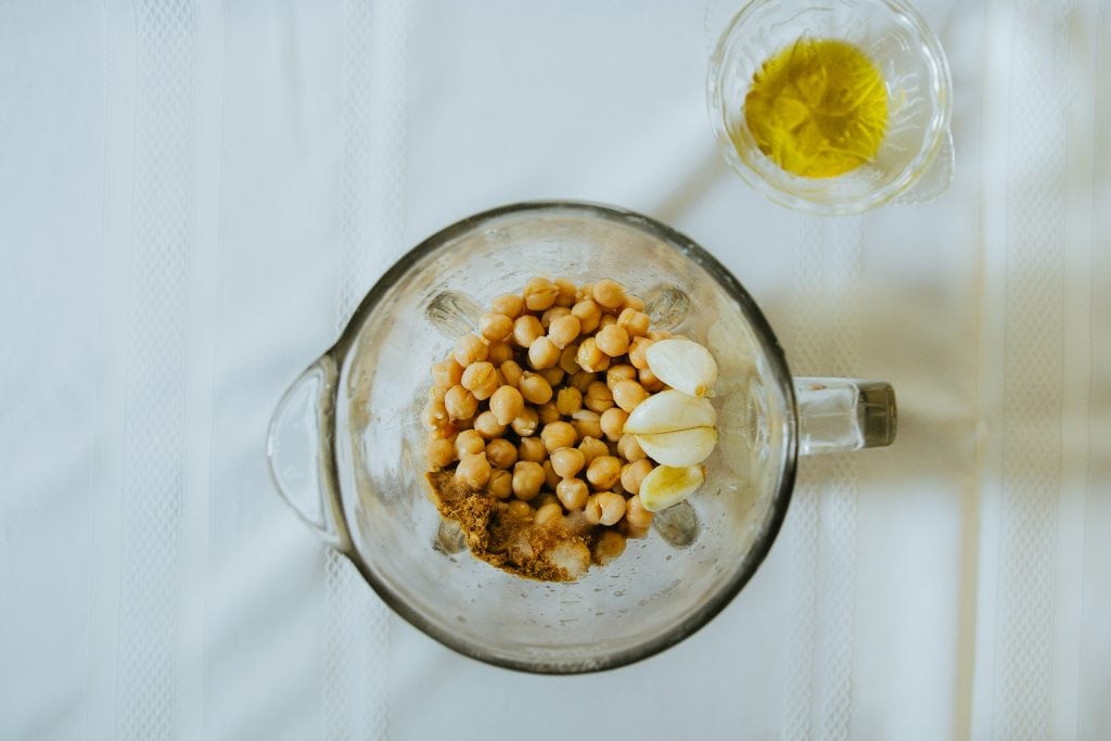 Ingredients for hummus prepared in a blender.