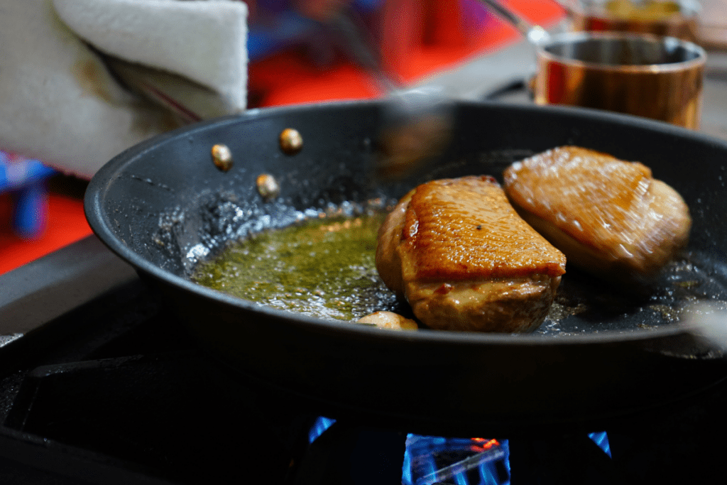 frying meat on a gas stove