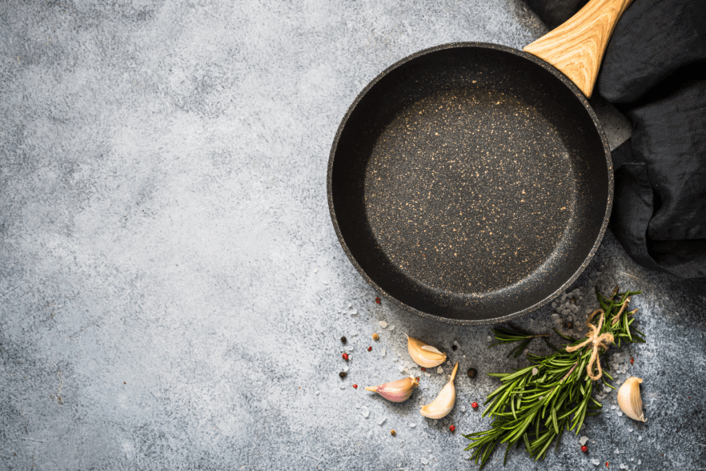 black pan with a wooden handle