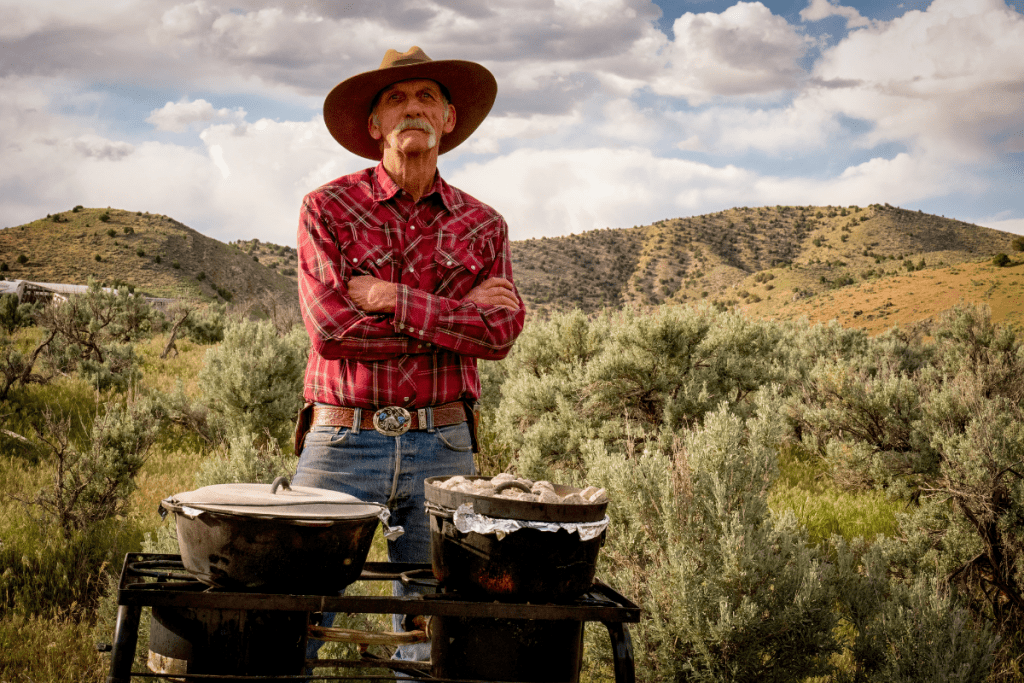 man cooking in a nature