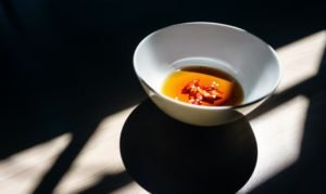 fish sauce in a white round bowl