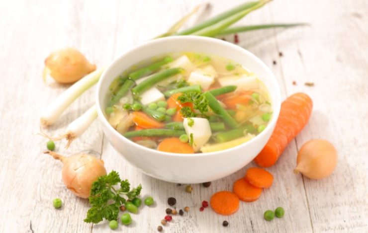 vegetable stock in a white bowl