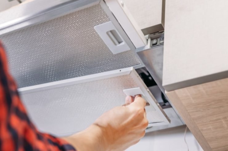 changing the filter on a range hood