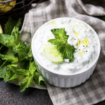 tzaziki sauce in a white bowl