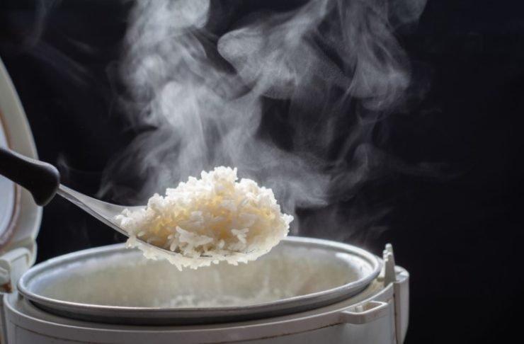 Tasty Steam Rice on a spoon