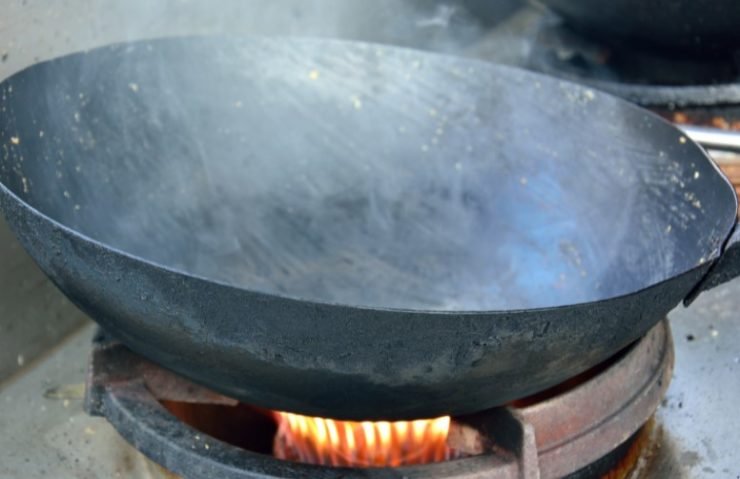 faint white smoke out of the wok