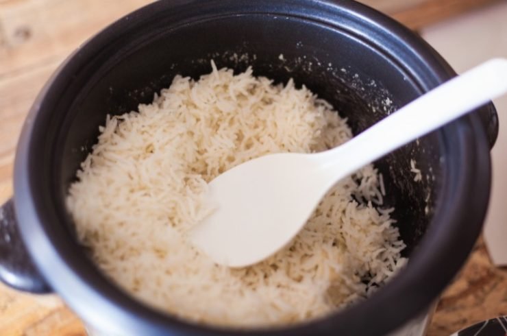 Fresh cooked basmati rice in rice cooker, close-up