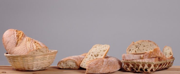 different types of a bread in a basket