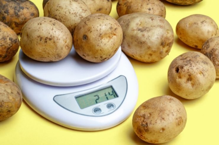 potatoes on small household scales