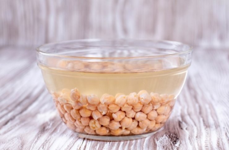 Chickpeas soaked in water in a bowl
