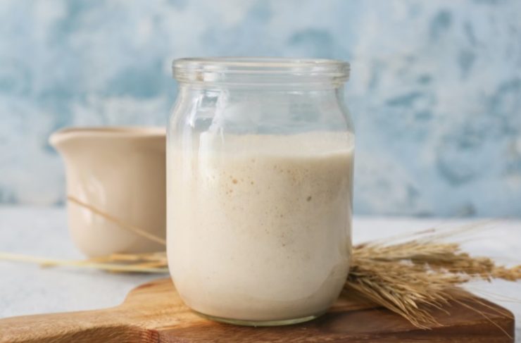 Jar with Sourdough and Spikelets on Table