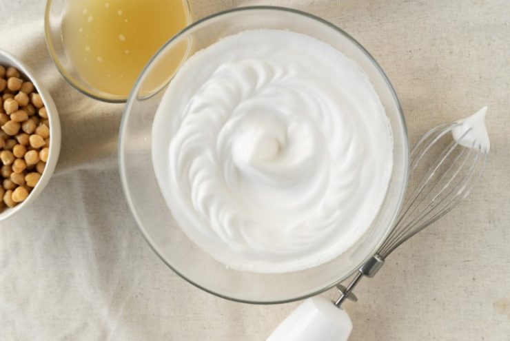 image of bowls with chickpeas , chickpea's liquid water brine and whipped aquafaba , egg replacer in cooking