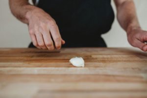 garlic on wooden surface