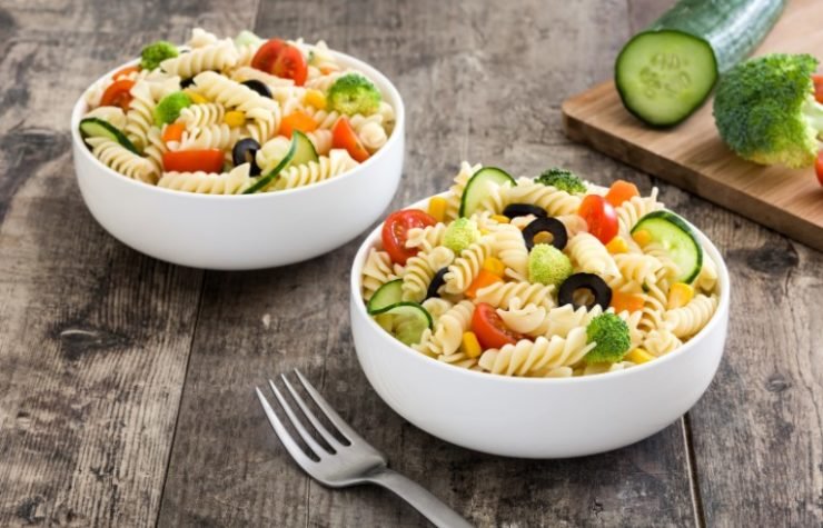 two bowls of pasta salad