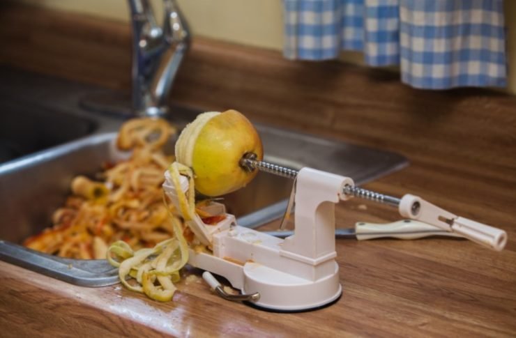 apple peeler corer spiral slicer on kitchen countertop
