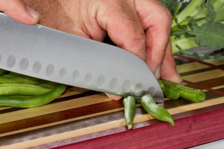trimming green beans with knife
