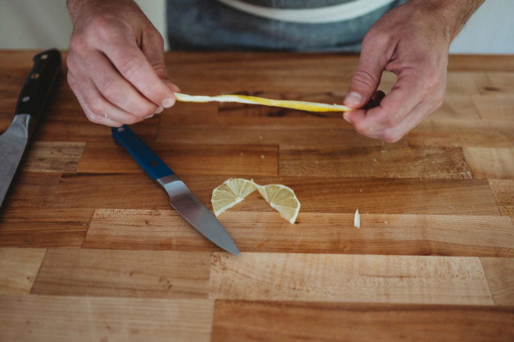 person holding lemon twist