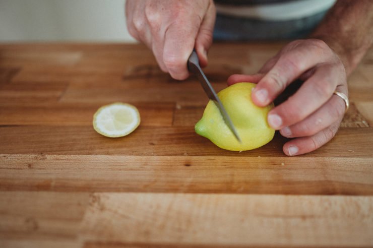 lemon cutting on a cutting board