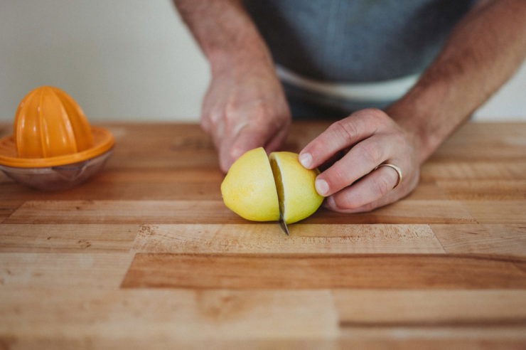 cutting lemon in half