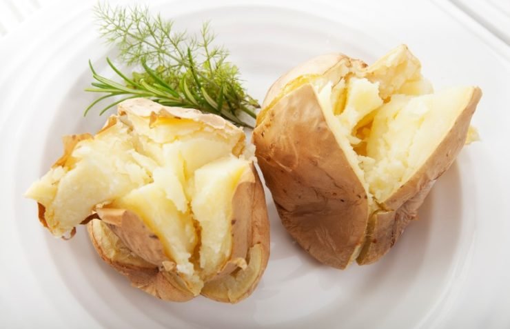 baked potatoes on a white plate