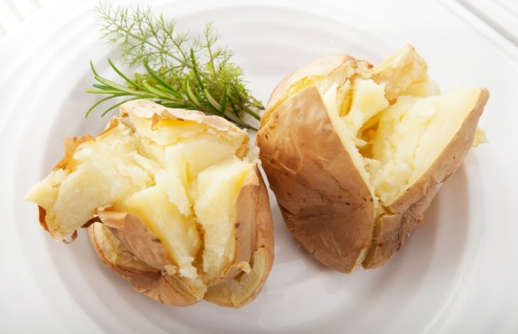 baked potatoes on a white plate