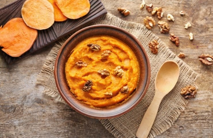 Bowl with Mashed Sweet Potato on Table