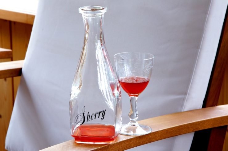 sherry bottle with glass
