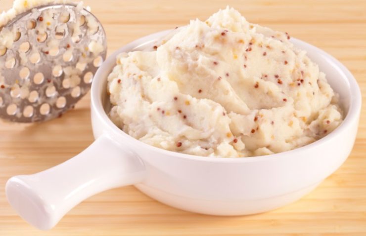 Mustard Mashed Potato in a white bowl