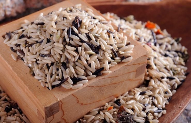 wild rice on a wooden surface
