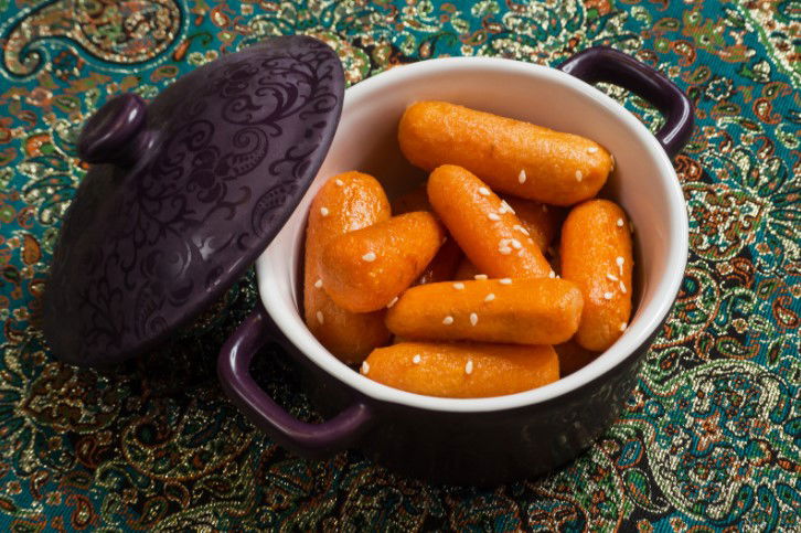 Honey glazed carrots with sesame seeds. Top view.