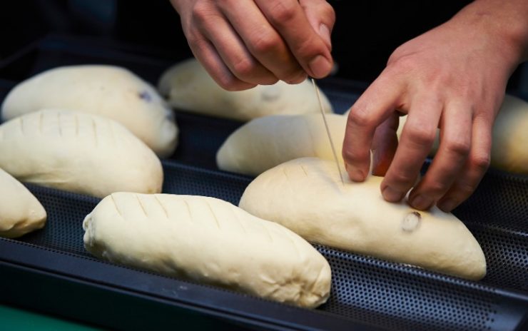 making cuts on a bread