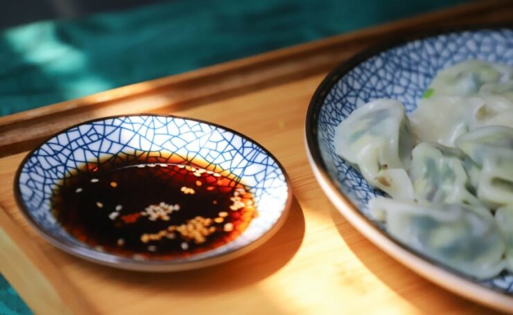 Round Blue Saucer Filled With Tamari